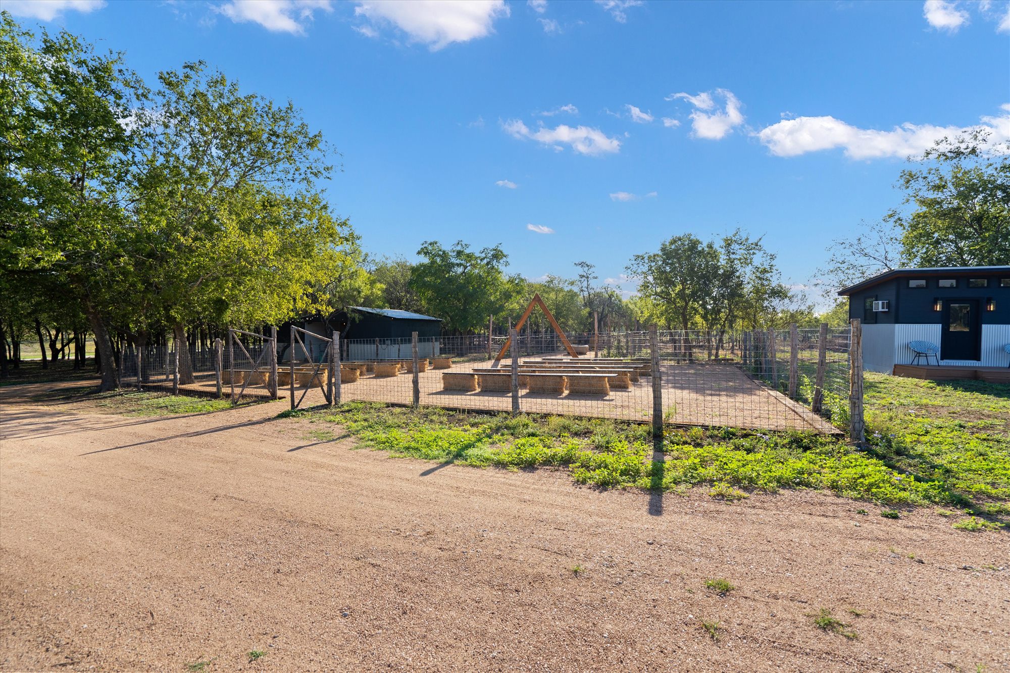 Wide view of the outdoor wedding ceremony space at Windy Ridge Ranch